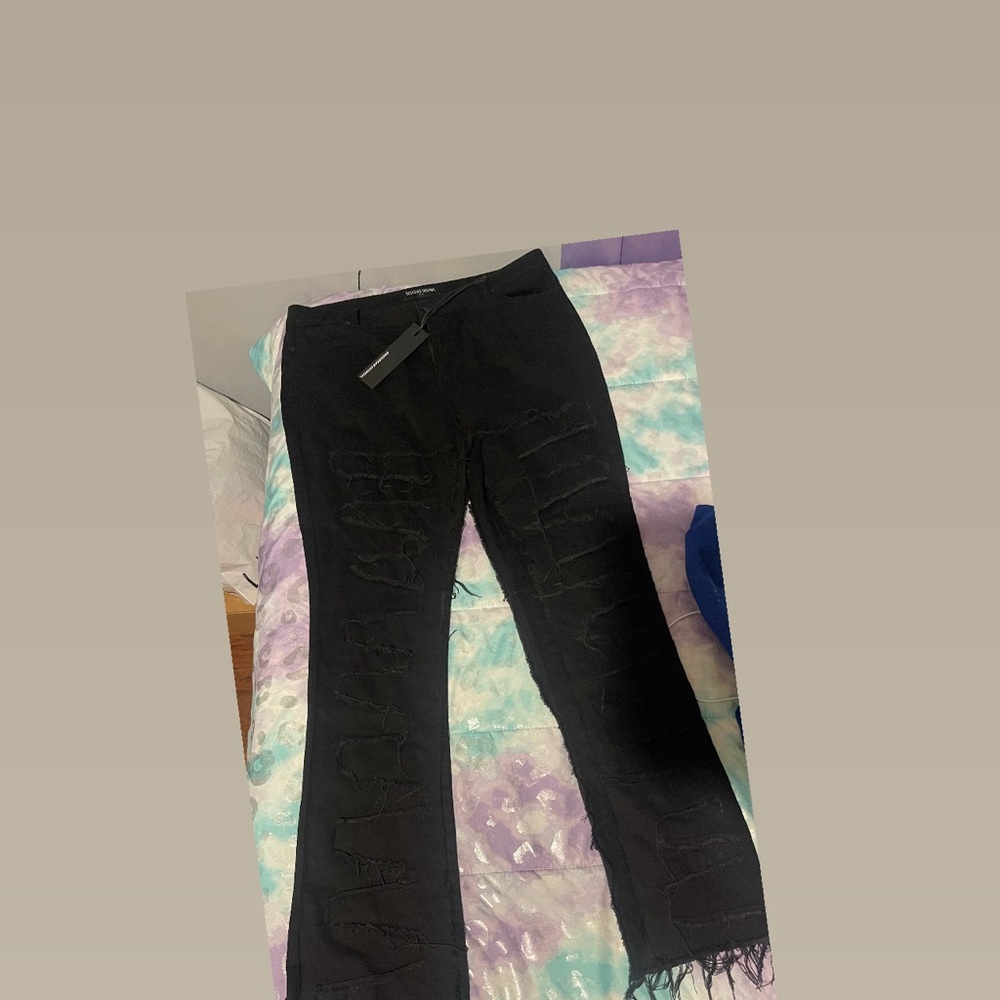 Elegant Black Distressed Flare Jeans staked jeans